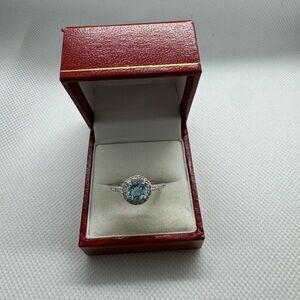 10 K genuine, diamond and aquamarine ring